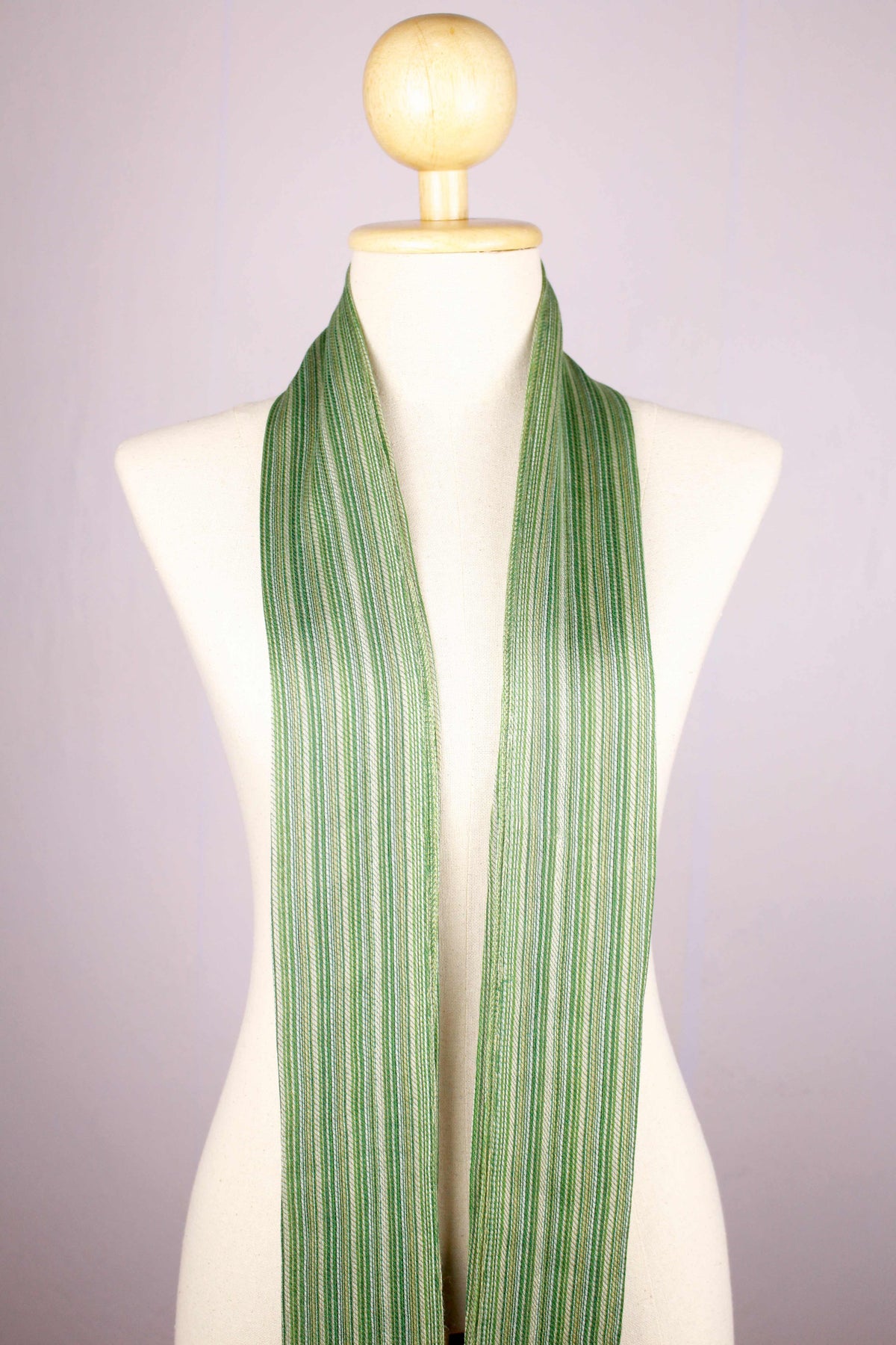 Women's 100% Bamboo Shades of Green Striped Scarf – Draped Mannequin View