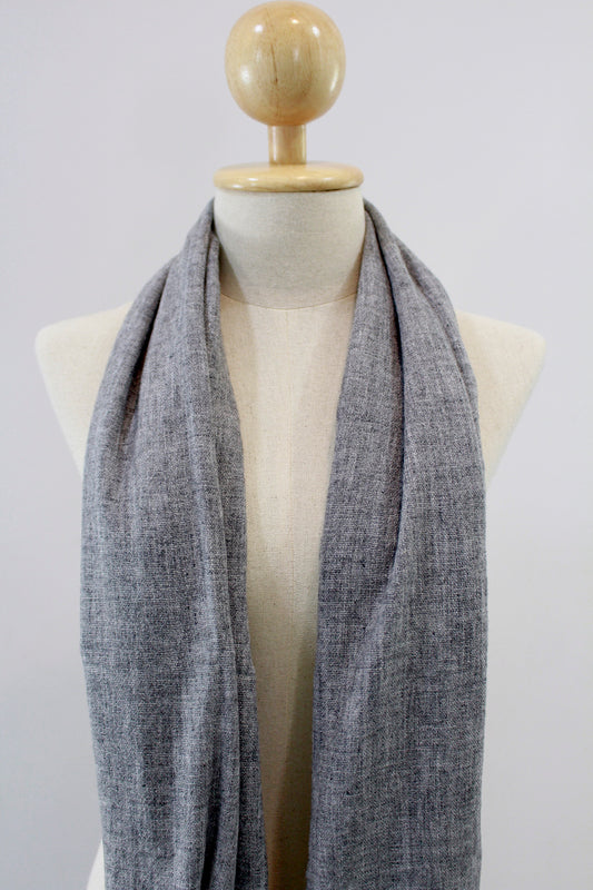 Ash Gray cashmere scarf displayed on a mannequin, draped front view.