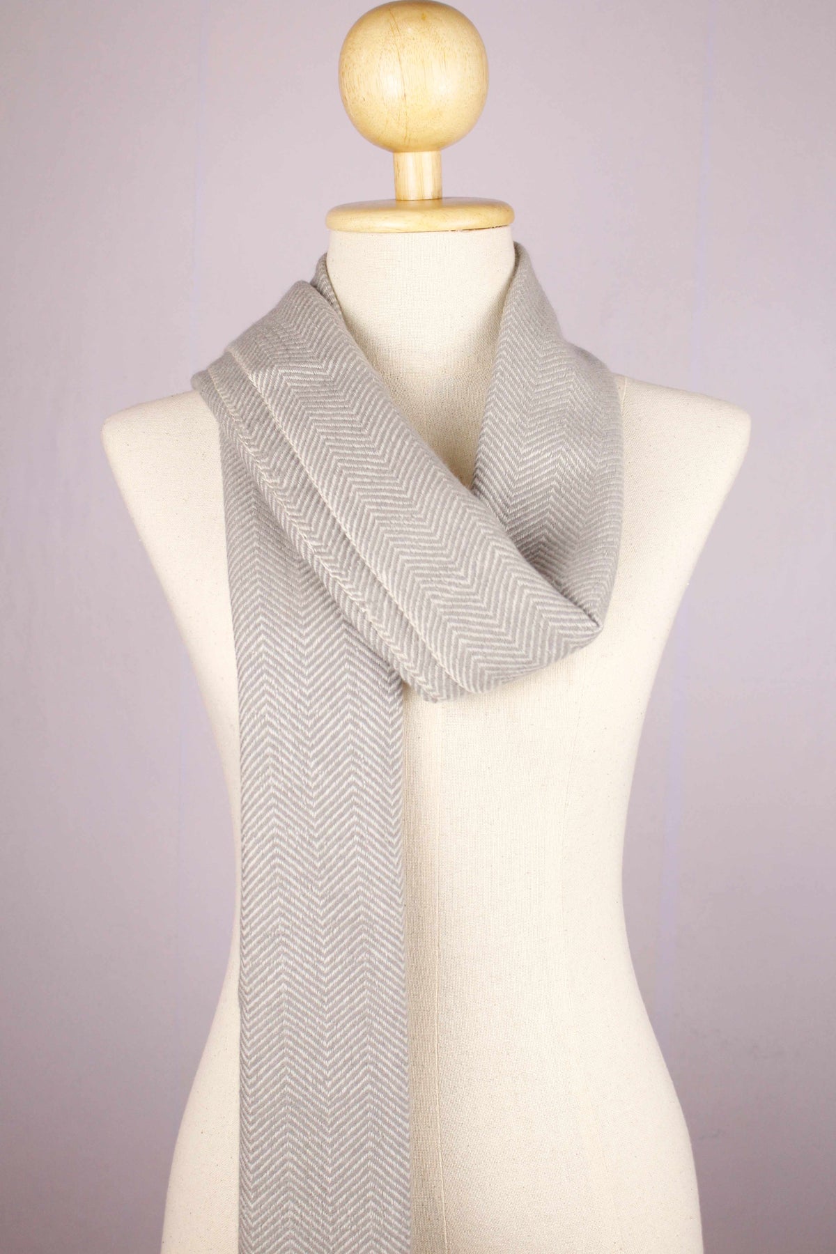 Women's cashmere wool chevron warm gray scarf toss draped, full product view