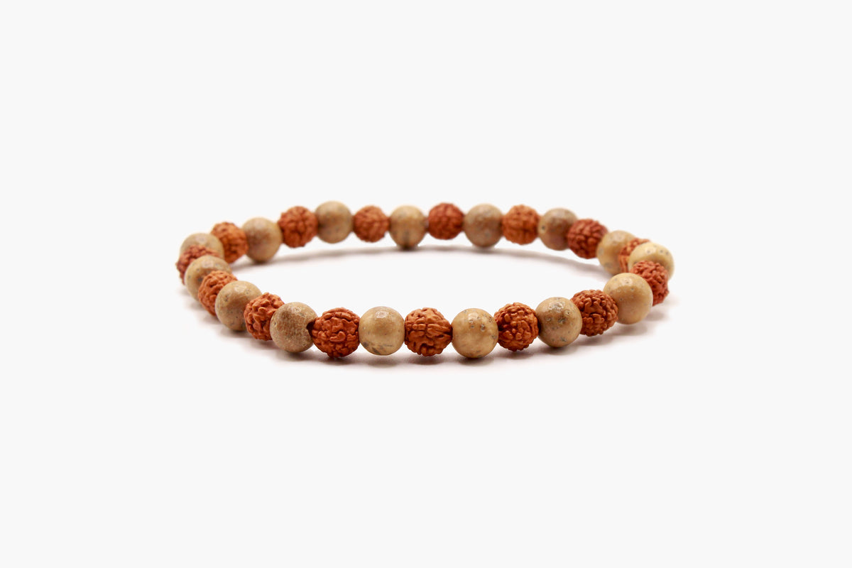 6 mm Rudraksha and Lotus seed bracelet with alternating brown and natural beige beads.