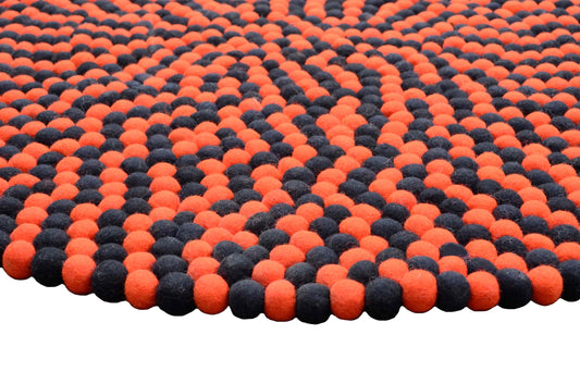 Round Black And Orange Wool Felt Ball Rug