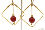 BRASS SQUARE BOUNDED BLOOD RED CRYSTAL DANGLE EARRING