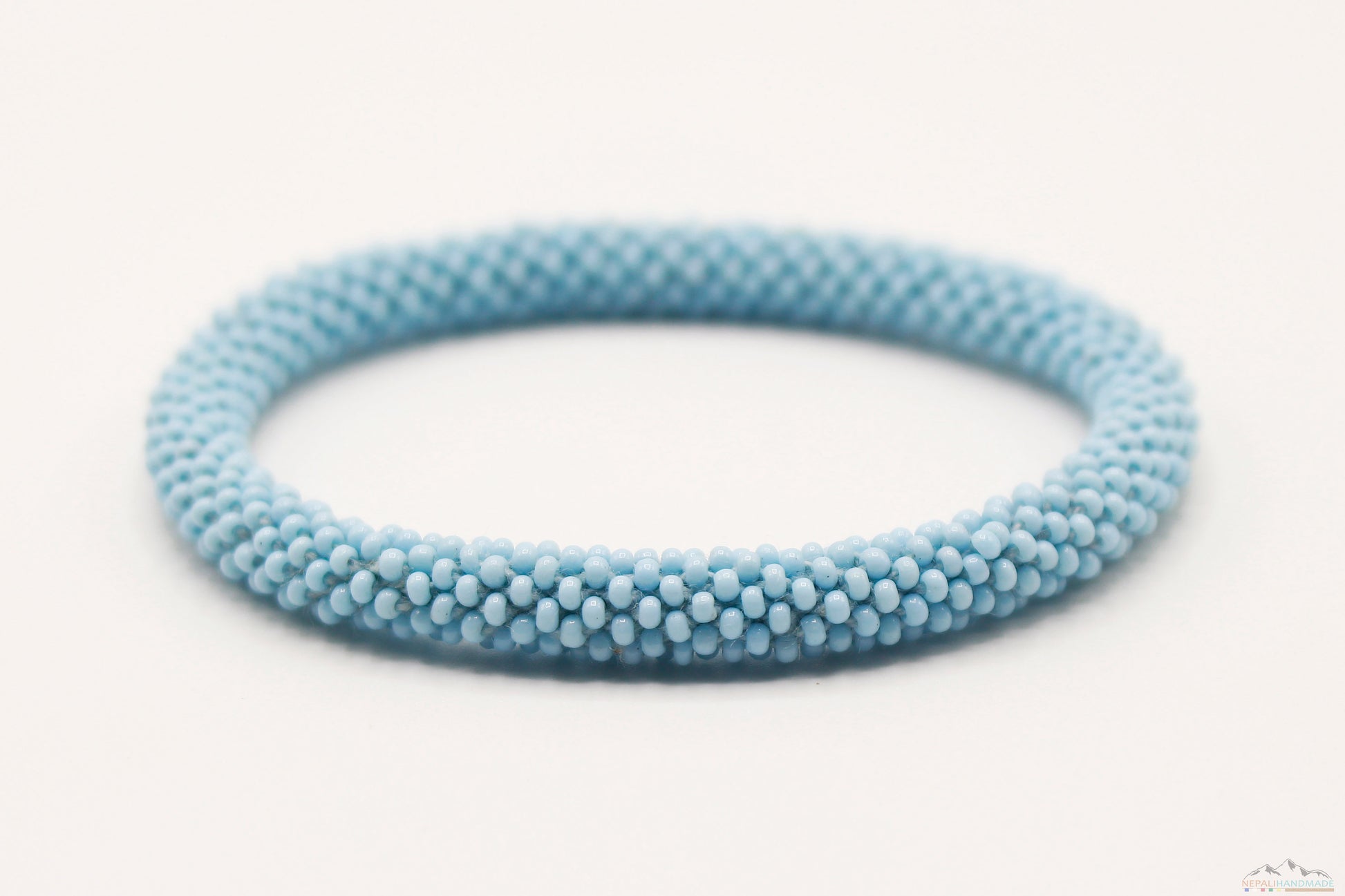 Light Blue Glass Beads Roll On Bracelet