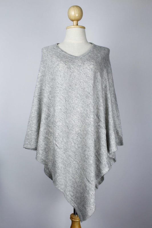 Women's Light Gray cashmere V-neck poncho displayed on a mannequin, front view.