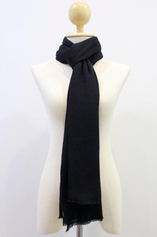 Classic Black cashmere scarf looped style display on a mannequin.