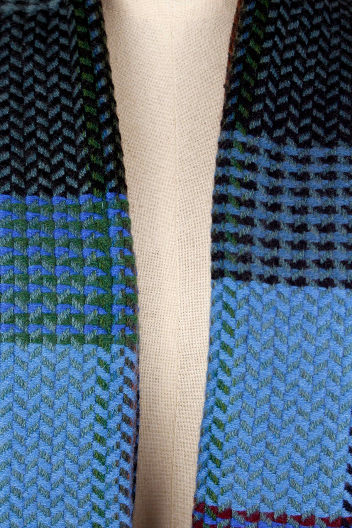 men's cashmere wool herringbone scarf showing the shades of blue pattern and twill weave
