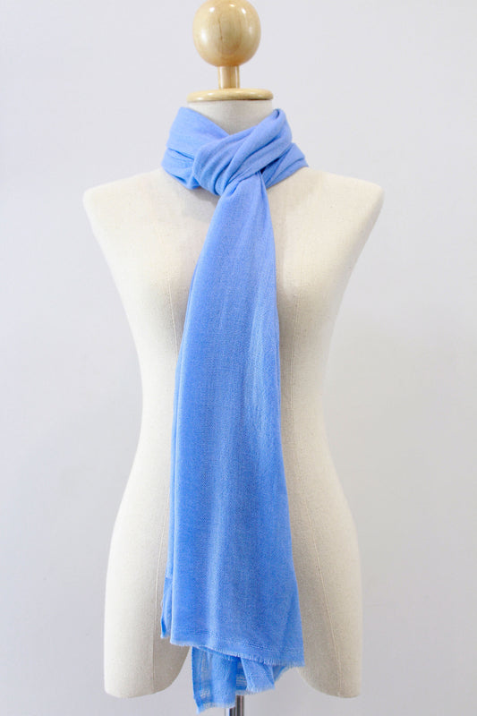 Sky Blue cashmere scarf loop style, displayed on a mannequin.